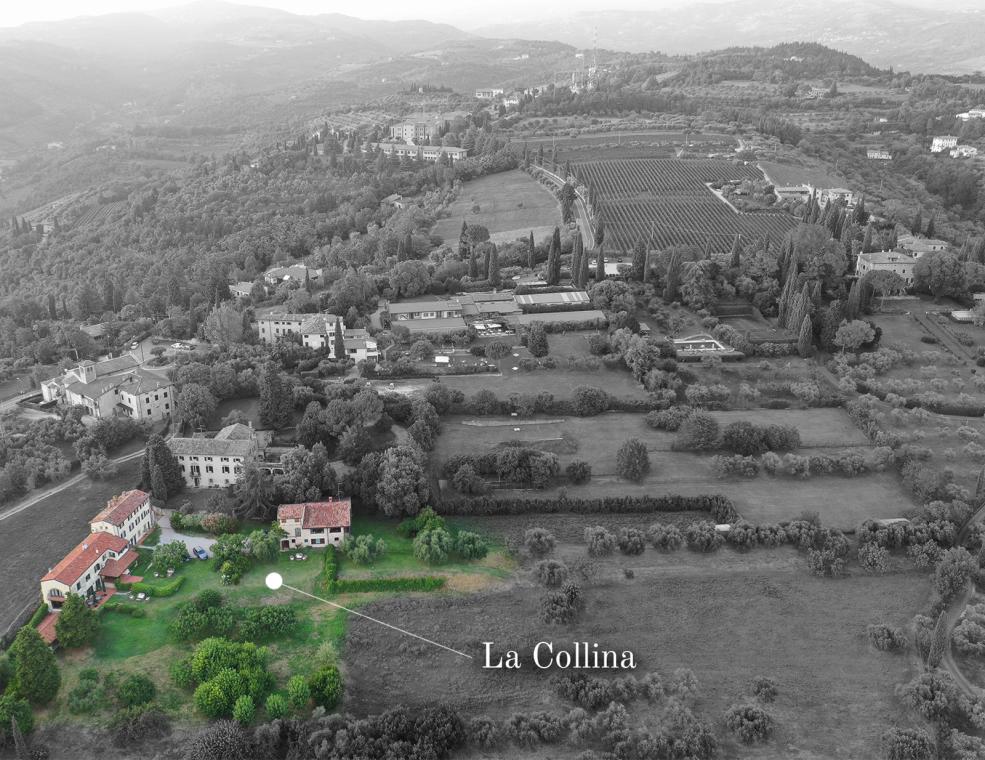 Vista aerea di Borgo La Collina, evidenziato in verde tra colline e vigneti.
